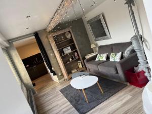 Posezení v ubytování Appartement de caractère