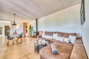 a living room with a couch and a table at Ideal Property Mallorca - Es Claperas in Inca
