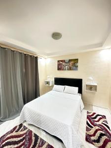 Säng eller sängar i ett rum på Modern Gueliz 2 Bedroom Apartment