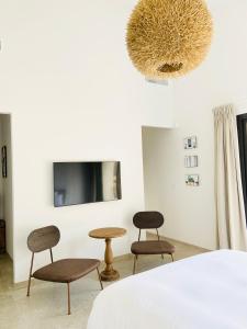TV a/nebo společenská místnost v ubytování Le Clos Celine