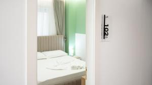 Postel nebo postele na pokoji v ubytování Hotel Luris