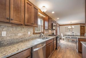 Kuchyň nebo kuchyňský kout v ubytování Happy Ours + 36 fotografií