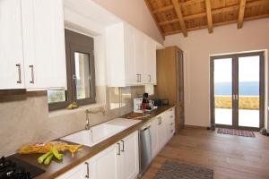 A kitchen or kitchenette at Kika Residences