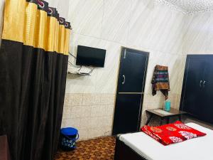 TV/Unterhaltungsangebot in der Unterkunft Hotel dinesh