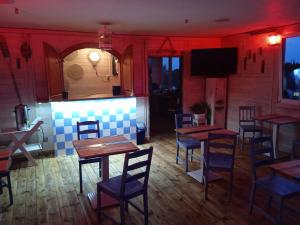 a restaurant with tables and chairs in a room at K 2 in Jastrzębia Góra +34 photos