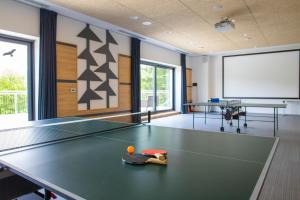 Stolní tenis v ubytování Amenity Hotel & Resort Orlické hory nebo okolí