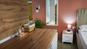 Postel nebo postele na pokoji v ubytování Hotel Luris