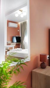 Postel nebo postele na pokoji v ubytování Hotel Luris