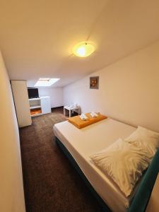 Postel nebo postele na pokoji v ubytování Guest house Davorka