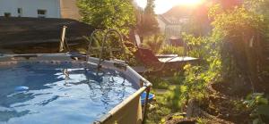 Zahrada ubytování R3 - Urlaubsmagie - Helle Wohnung mit Garten & Pool + 38 fotografií
