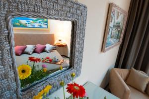 Postel nebo postele na pokoji v ubytování Holiday Rooms Antica Badia