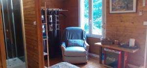 Posezení v ubytování Chambre La Caunette