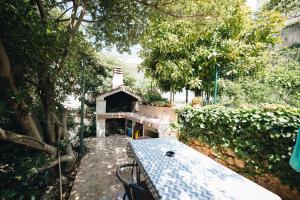 Vonkajšia záhrada v ubytovaní Apartment Marghareta