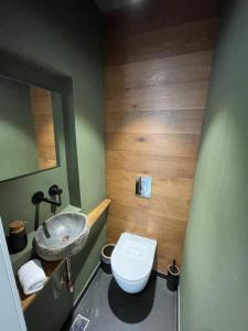 a bathroom with a sink and a toilet at Prime location apartment in TLV in Tel Aviv