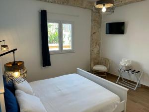 Postel nebo postele na pokoji v ubytování Room On The Beach