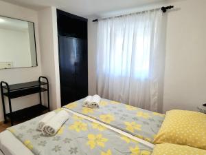 Postel nebo postele na pokoji v ubytování Apartment Deni