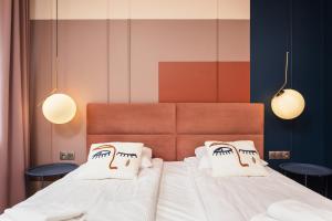 Posteľ alebo postele v izbe v ubytovaní Polka Apartment