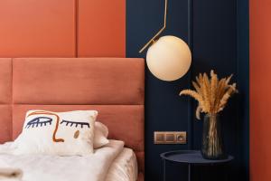 Posteľ alebo postele v izbe v ubytovaní Polka Apartment
