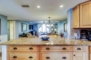 a kitchen with a large counter top in a room at Island Club 1 in Hilton Head Island