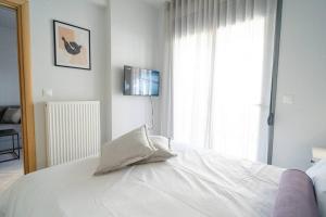 Postel nebo postele na pokoji v ubytování #S20 Chic 1 BR apartment in the centre of Volos
