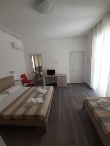 Postel nebo postele na pokoji v ubytování La Llua Alghero