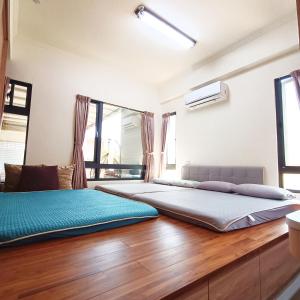 Voodi või voodid majutusasutuse 枋寮鳥窩窩 toas
