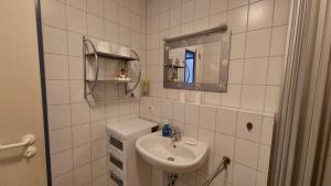 Koupelna v ubytování Boddenblick Breege + 11 fotografií