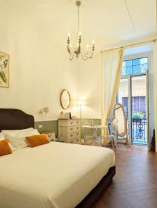 Krevet ili kreveti u jedinici u objektu Macchiato Suites Boutique Guest House