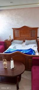 Postel nebo postele na pokoji v ubytování Qamar's guests 2