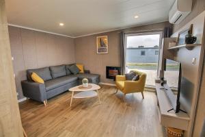 Posedenie v ubytovaní Chalet avec clim - Piscine - 4 adultes - 2 enfants