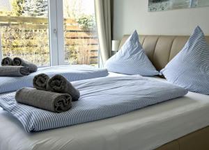 Кровать или кровати в номере Strandperle; idyllisch gelegen mit Terrasse und Garten, für 4 Personen