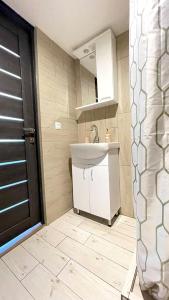 Ванна кімната в Квартира-студія в центрі міста біля Ратуші