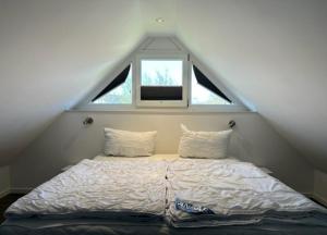 Postel nebo postele na pokoji v ubytování Tauwerk - Erholung im idyllischen Ortskern