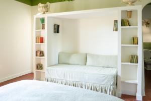 Ένα ή περισσότερα κρεβάτια σε δωμάτιο στο Les Chambres de la Relève +24 φωτογραφίες