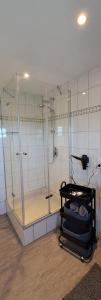 a bathroom with a shower with a glass enclosure at 4ty-Veitsrodt in Veitsrodt