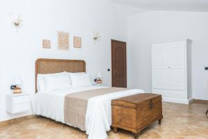 Postel nebo postele na pokoji v ubytování Relais Ruggiero