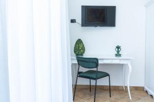 TV a/nebo společenská místnost v ubytování Relais Ruggiero