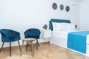 Postel nebo postele na pokoji v ubytování Relais Ruggiero