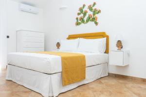 Postel nebo postele na pokoji v ubytování Relais Ruggiero