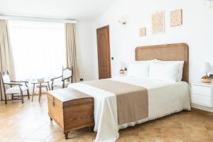 Postel nebo postele na pokoji v ubytování Relais Ruggiero