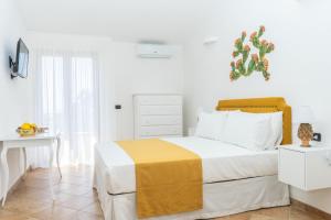Postel nebo postele na pokoji v ubytování Relais Ruggiero
