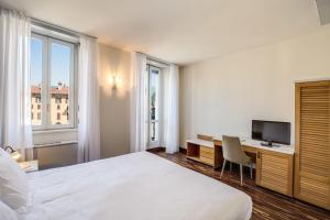 Una cama o camas en una habitación de Albergo Firenze