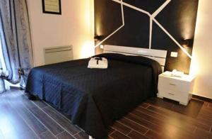 سرير أو أسرّة في غرفة في Bed & Breakfast Viziottavo