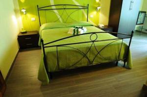 سرير أو أسرّة في غرفة في Bed & Breakfast Viziottavo