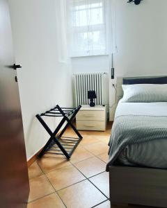 Postel nebo postele na pokoji v ubytování 85 mjka house free parking COMO
