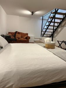 Postel nebo postele na pokoji v ubytování 85 mjka house free parking COMO