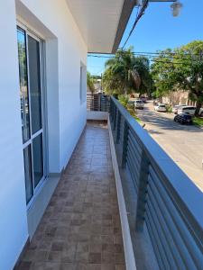 a balcony with a view of a street at Cálido y Amplio Dpto Céntrico 1D in Formosa