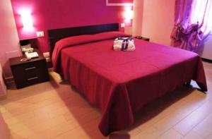 سرير أو أسرّة في غرفة في Bed & Breakfast Viziottavo