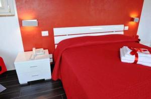 سرير أو أسرّة في غرفة في Bed & Breakfast Viziottavo
