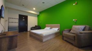 TV a/nebo společenská místnost v ubytování Your Home Hotel